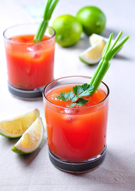 Bloody Mary cocktail with celery, Tabasco, pepper, sea salt and Worcestershire sauce - Photo, Image