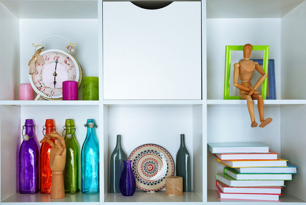 Beautiful white shelves with different home objects - Fotografie, Obrázek