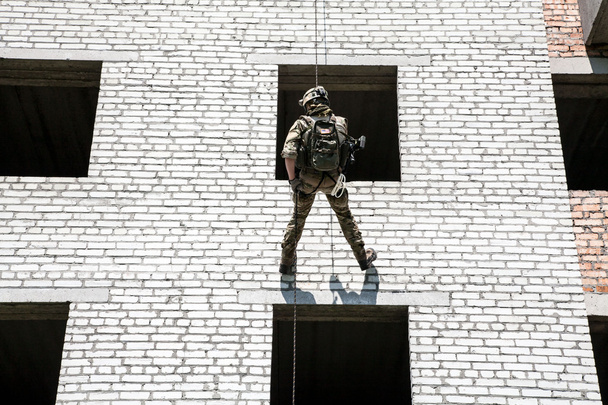 rappeling with weapons - Photo, Image
