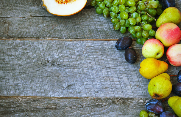 Sets fruit on wooden background.Copy space background. - Photo, Image