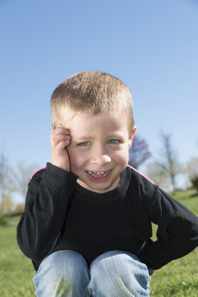 close up Portrait of happy joyful little boy smiling in summer - Foto, afbeelding