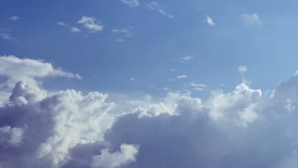 Clouds on hot blue sky, time lapse - Footage, Video