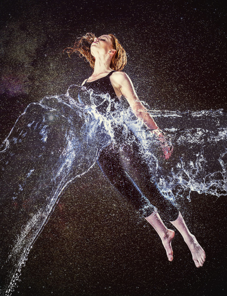 Thoughtful Woman in Water Splash Floating in Air - Photo, image