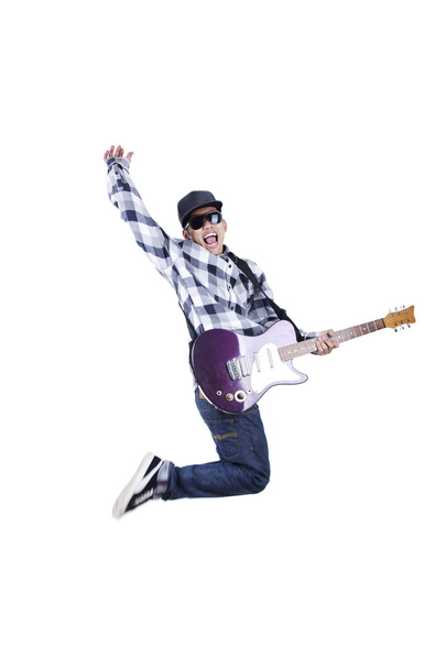 Guy jumps with guitar - Foto, imagen
