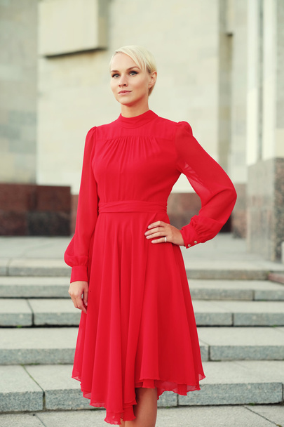 Happy beautiful woman in red summer dress - Zdjęcie, obraz
