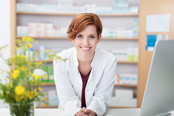 Smiling happy confident young woman pharmacist - Foto, Imagem
