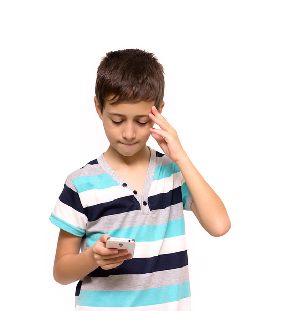 boy with mobile thinking - Foto, Imagen
