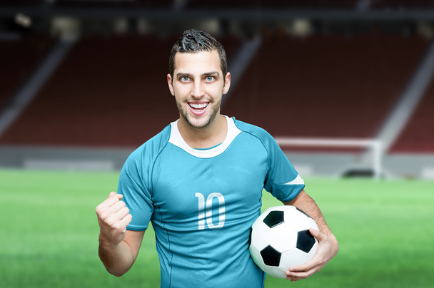 Fußballfan feiert in blauem T-Shirt - Foto, Bild