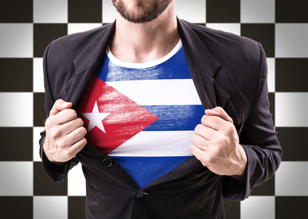 Homme d'affaires étirant costume avec drapeau cubain
 - Photo, image