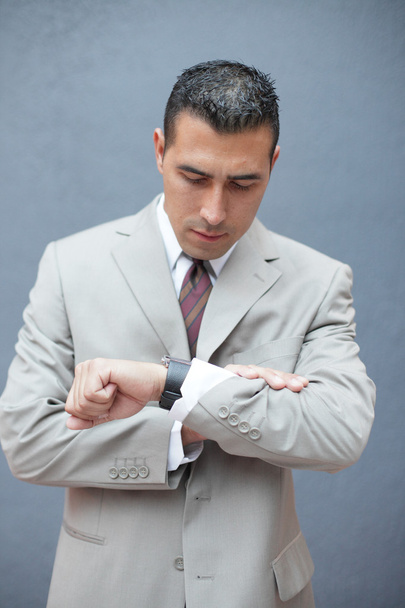 Businessman checking the time - Foto, Imagen