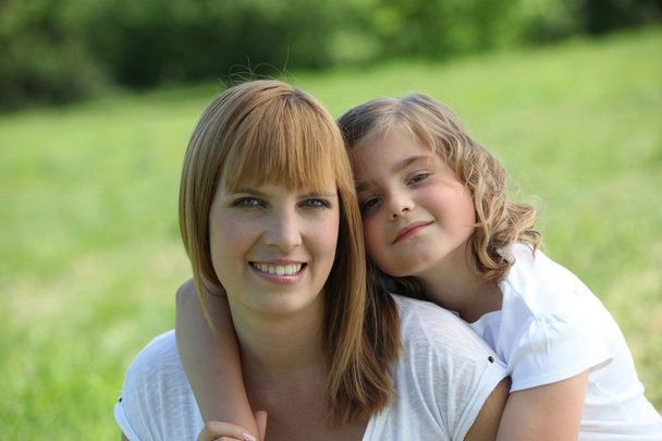 Mother and daughter in a park - Foto, immagini