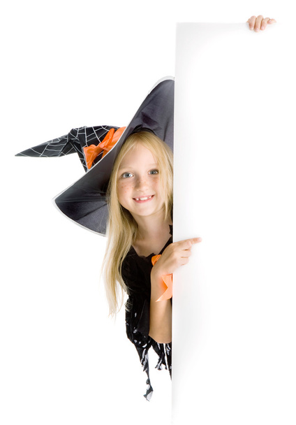 Little playful witch holding the Copy space - Foto, Imagen