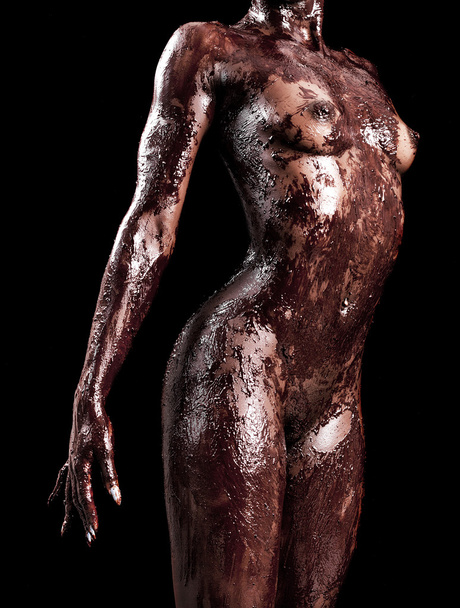 African model posing naked with body covered with chocolate - Fotó, kép