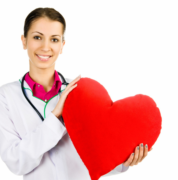 Doctor taking care of red heart symbo - Foto, Bild