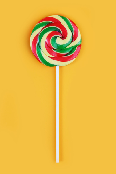 Sweet colorful candy with a stick - Foto, Imagem