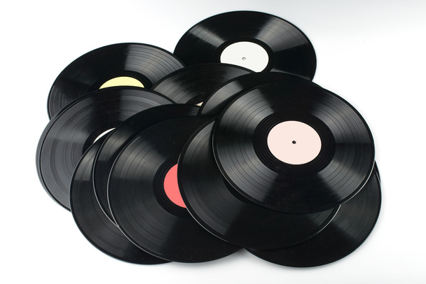 Vinyl discs on white background - Фото, изображение