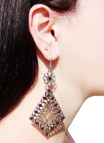 earrings jewellery with bright crystals in ear - Photo, Image