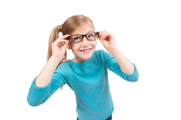 cute schoolgirl in glasses on a white background smiling - Foto, immagini