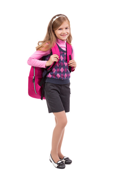 school girl with a backpack on a white background smiling - Photo, Image