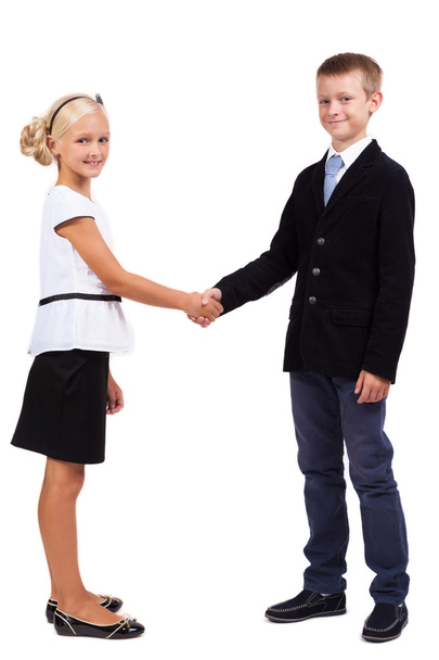 Students in business suits on a white background shake hands - Фото, зображення