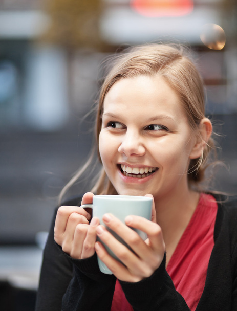 Pretty young woman with cup of chocomilk - Zdjęcie, obraz