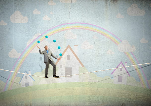 Businessman juggling with balls - Photo, Image