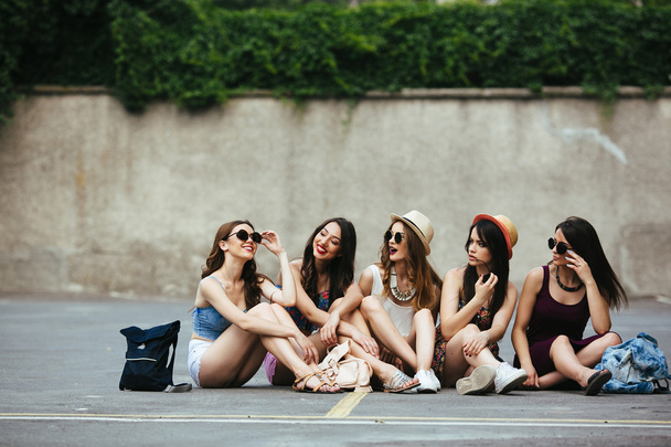 Five beautiful young girls relaxing - Photo, Image
