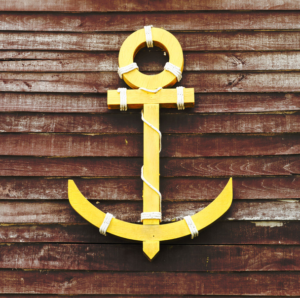 drewniane anchor na tle ścienne z drewna - Zdjęcie, obraz