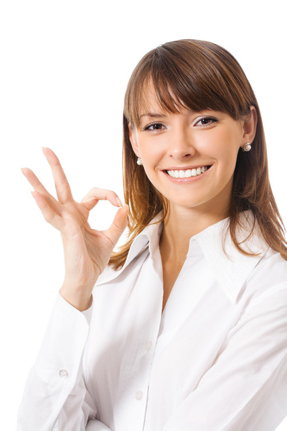 Business woman with okay gesture, on white - Foto, Imagen