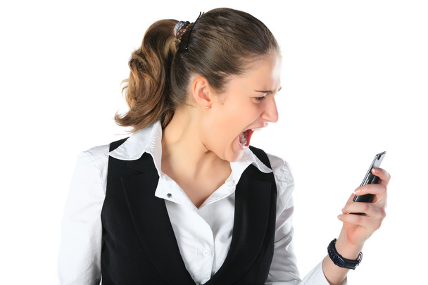 A woman shouting at a mobile phone - Фото, зображення