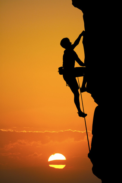 klimmen bij zonsondergang - Foto, afbeelding
