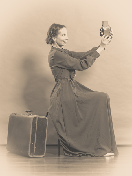 Woman retro style with old suitcase camera - Фото, зображення