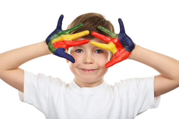 Portrait of beautiful little boy with paints on hands isolated o - Foto, immagini