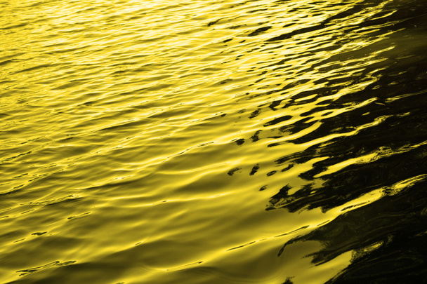 Gold water with sun reflections background texture - Photo, Image
