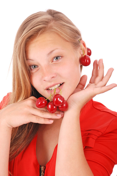 Girl hold in lips fresh cherries - Фото, изображение