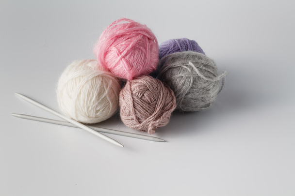 Clews of colored yarn with niddle - Zdjęcie, obraz