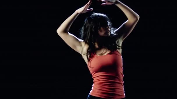 Young woman dancing - Materiał filmowy, wideo