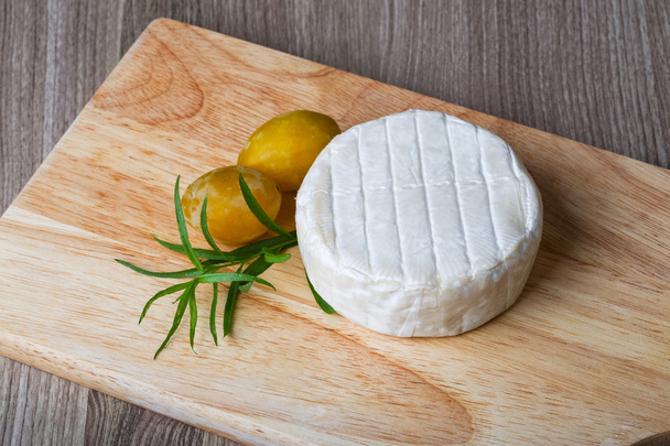 Brie cheese with yellow plums - Photo, Image