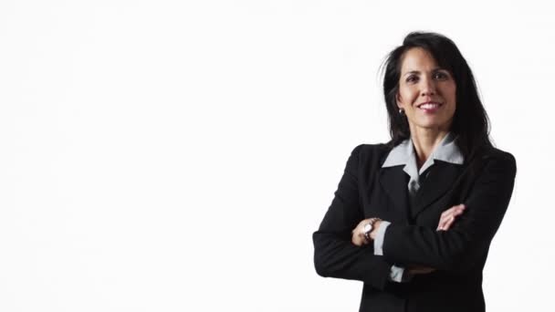 Businesswoman smiling with arms crossed - Filmati, video
