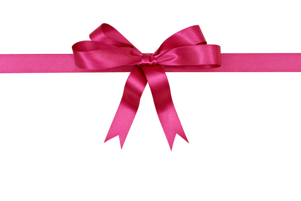 Pink gift ribbon and bow isolated on white background horizontal - Photo, Image