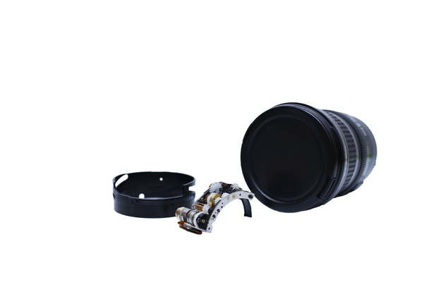 Herstellen van onderdelen van enkele lens camera geïsoleerd - Foto, afbeelding