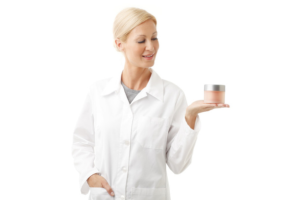 beauty specialist holding cream jar - Foto, Imagem