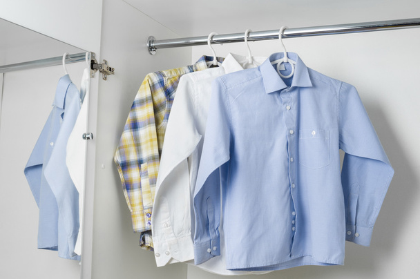 white blue and checkered clean ironed men shirts - Φωτογραφία, εικόνα