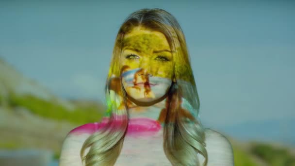 projections with summer theme on female face - Materiał filmowy, wideo