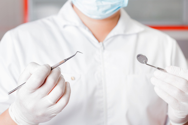 dentist doctor treatment with dental tools or instruments - 写真・画像