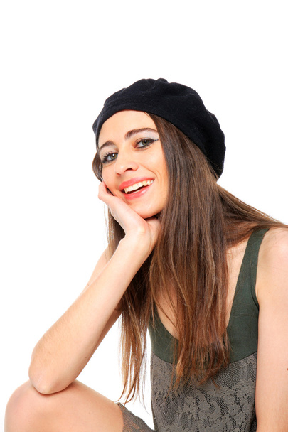 Beautiful smiling woman wearing a beret hat - Φωτογραφία, εικόνα