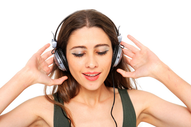 Cool teenager listening to music and dancing - Φωτογραφία, εικόνα