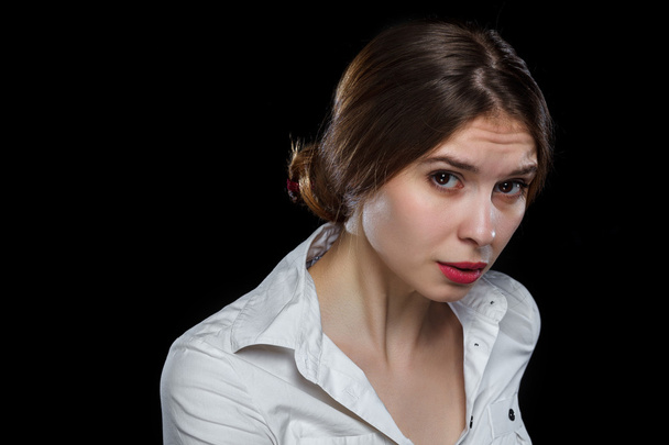 Young casual woman isolated over black background - Foto, Bild