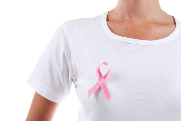Pink Ribbon Sign on female shirt - 写真・画像