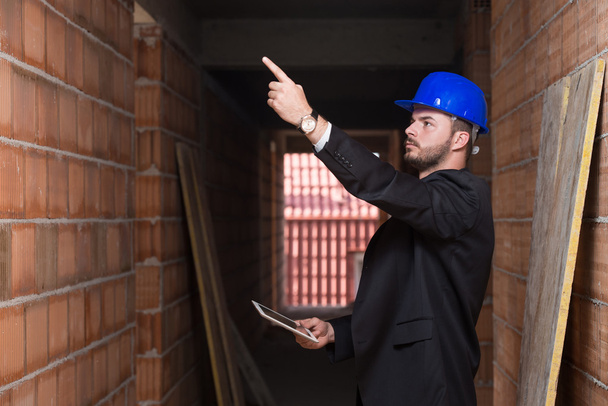 Businessman Pointing On Ceiling - Foto, Imagen
